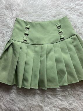 The Kript green pleated mini skirt
